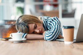 Shot,Of,Exhausted,Young,Business,Woman,Who,Has,Fallen,Asleep
